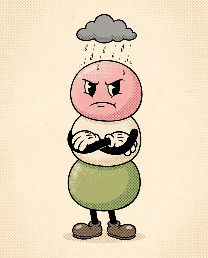 The mascot, grumpy but arms crossed, weathering a small rain cloud over its head